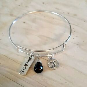 Bracelets by Sandra silver tone adjustable, miracle